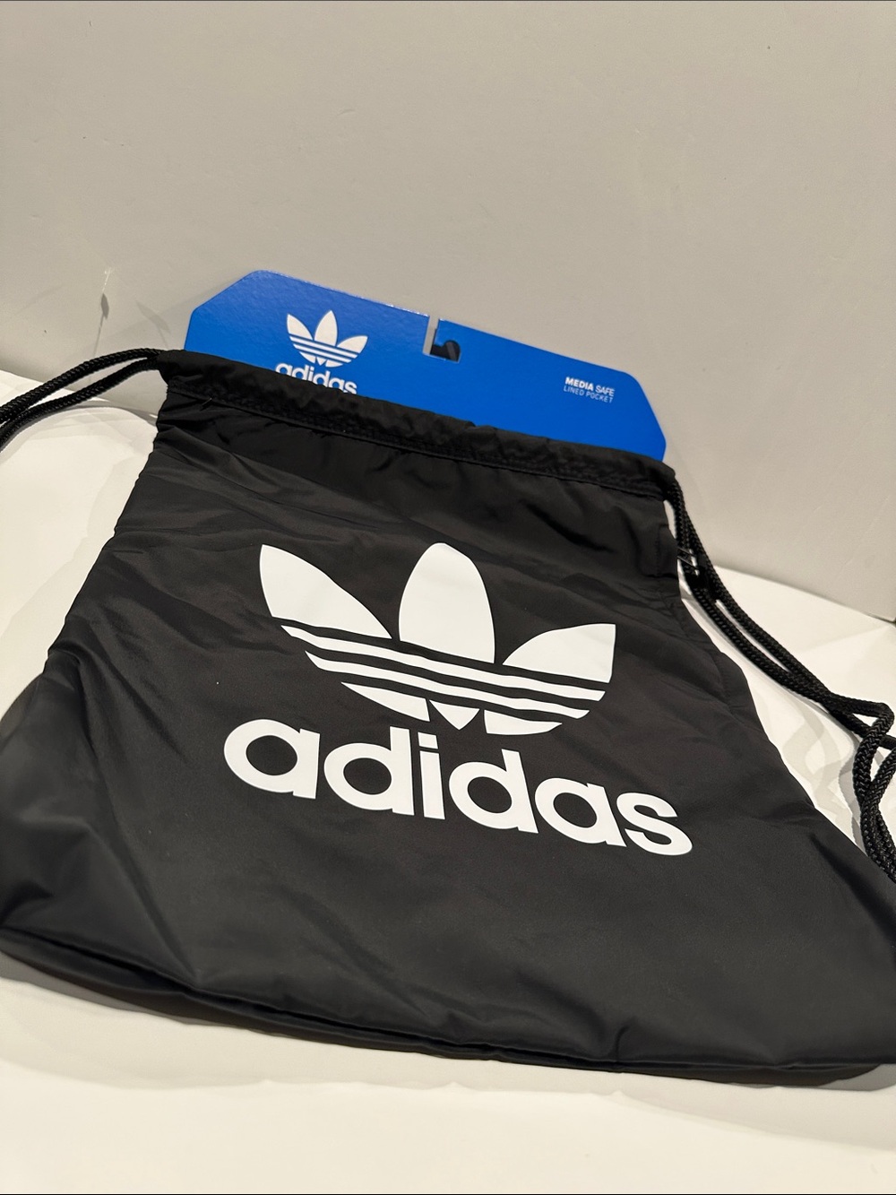 NWT Adidas Media Safe Fully Lines Pull String Back/Shoulder Bag w/Side pocket.
